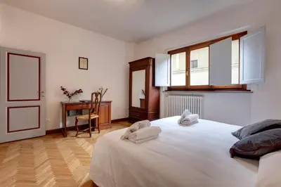 Letto o letti in una camera di Alfani Deluxe Apartment by Mamo Florence
