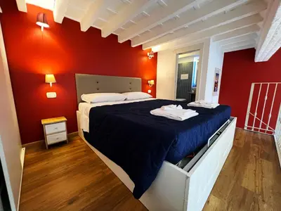 Letto o letti in una camera di LOFT IN FLORENCE