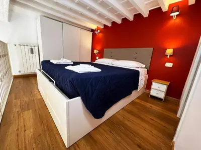 Letto o letti in una camera di LOFT IN FLORENCE