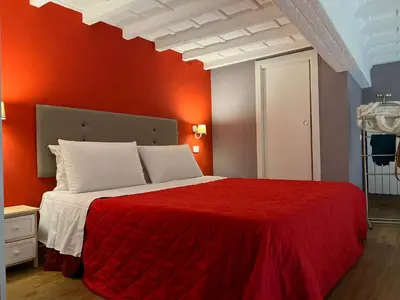 Letto o letti in una camera di LOFT IN FLORENCE