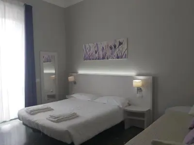 Letto o letti in una camera di Lodges le Mura