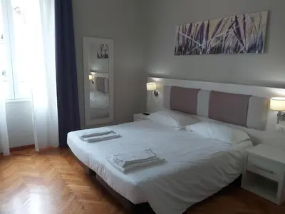 Letto o letti in una camera di Lodges le Mura