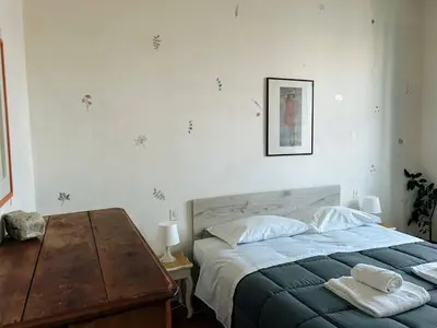 Letto o letti in una camera di Fancy Statuto Easy Stay