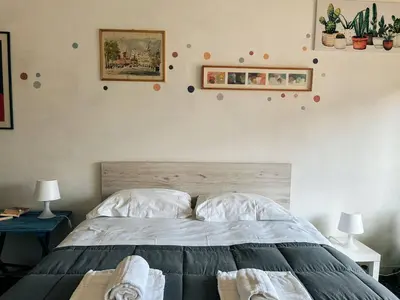 Letto o letti in una camera di Fancy Statuto Easy Stay