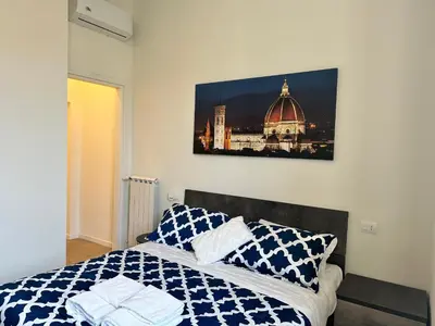 Letto o letti in una camera di Clyde Large Suite
