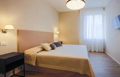 Letto o letti in una camera di Apartments Florence- Novella Bloom