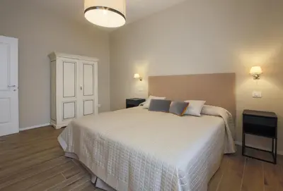Letto o letti in una camera di Apartments Florence- Novella Bloom