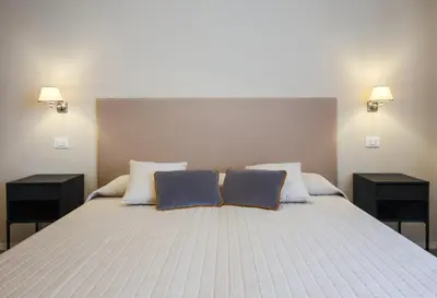 Letto o letti in una camera di Apartments Florence- Novella Bloom