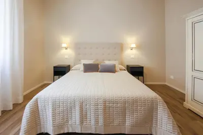 Letto o letti in una camera di Apartments Florence- Novella Bloom
