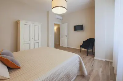 Letto o letti in una camera di Apartments Florence- Novella Bloom