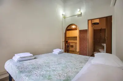 Letto o letti in una camera di Il Nido di Phili - Sweet Dreams in Florence