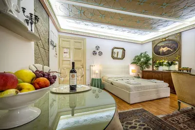 Letto o letti in una camera di Dei Medici Palace