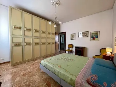 Letto o letti in una camera di Careggi Gold Colors
