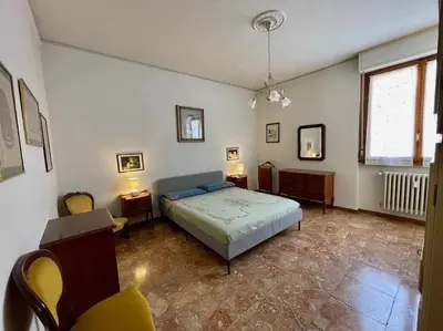 Letto o letti in una camera di Careggi Gold Colors