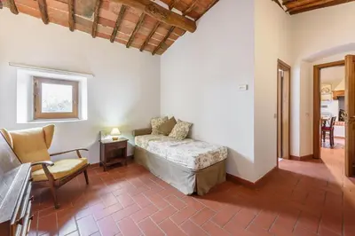 Letto o letti in una camera di Tenuta Poggio ai Mandorli