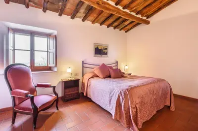 Letto o letti in una camera di Tenuta Poggio ai Mandorli