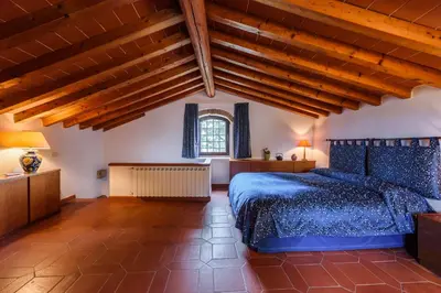 Letto o letti in una camera di Tenuta Poggio ai Mandorli