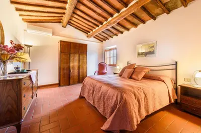Letto o letti in una camera di Tenuta Poggio ai Mandorli