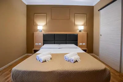 Letto o letti in una camera di EURHOTEL