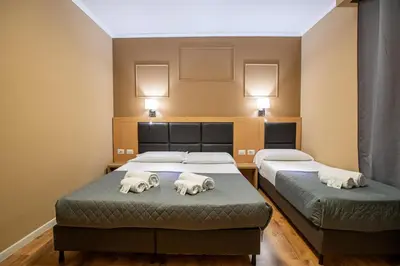 Letto o letti in una camera di EURHOTEL