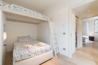 Letto o letti in una camera di Boboli - Flo Apartments