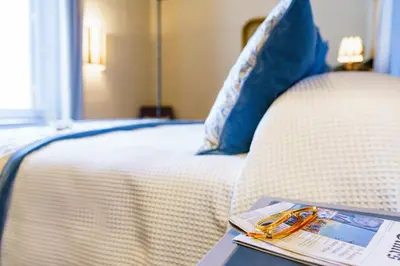 Letto o letti in una camera di Donna Lipsi - La Dimora degli Affreschi Florence