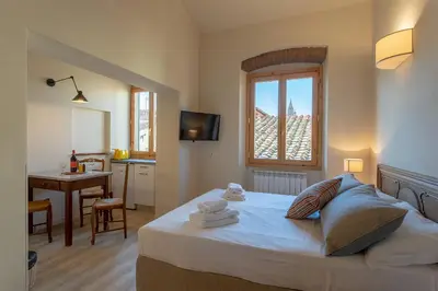 Letto o letti in una camera di Ramaglianti Apartments Suite Tre