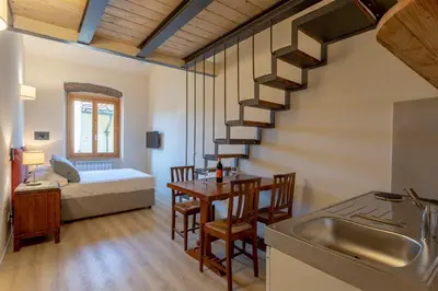 Letto o letti in una camera di Ramaglianti Apartments Suite Tre