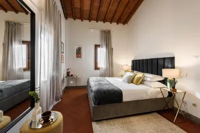 Letto o letti in una camera di Apartments Florence- Faenza Terrace