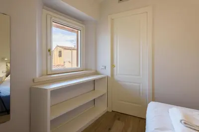 Letto o letti in una camera di Santa Croce Top by Mmega