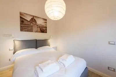 Letto o letti in una camera di Santa Croce Top by Mmega