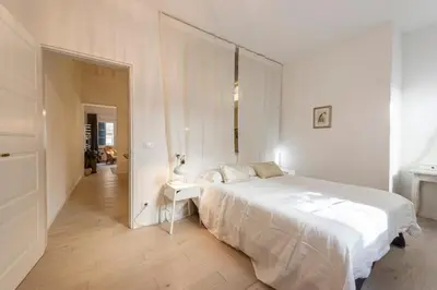 Letto o letti in una camera di Apartments Florence- Chandelier apartment