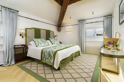 Letto o letti in una camera di Marchesa Olympia City View- La Dimora degli Affreschi Florence