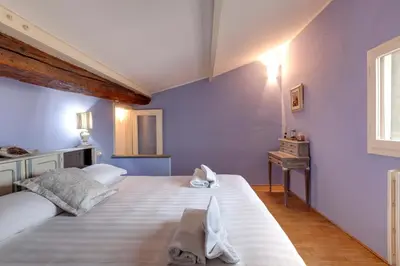 Letto o letti in una camera di Casper Apartment by Mamo Florence