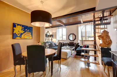 Area soggiorno di Casper Apartment by Mamo Florence