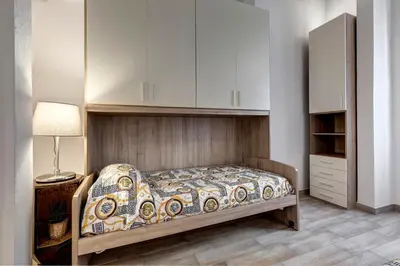 Letto o letti in una camera di La casina delle 6M