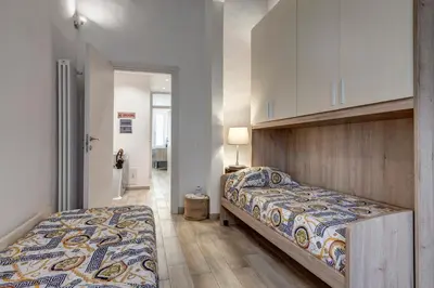 Letto o letti in una camera di La casina delle 6M