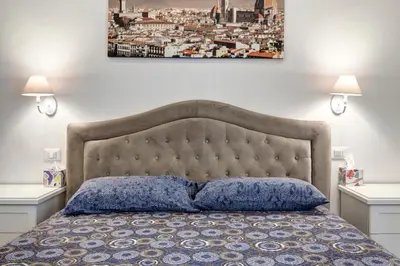 Letto o letti in una camera di La casina delle 6M