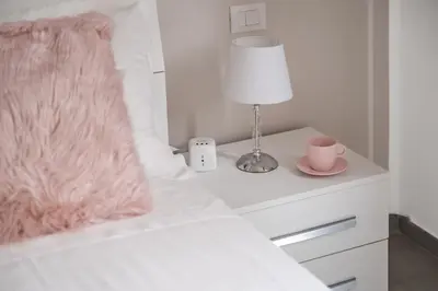 Letto o letti in una camera di Via Ponte alle Mosse, 19 - Florence Charming Apartments - A chic, newly renovated apartment near Tram Leopolda, a few min from downtown