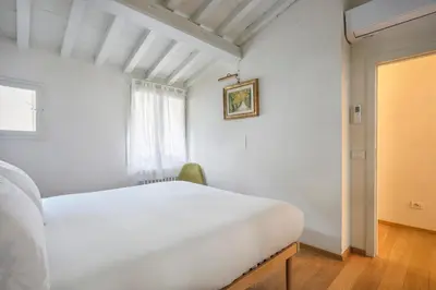 Letto o letti in una camera di Florentine Gem Apartment