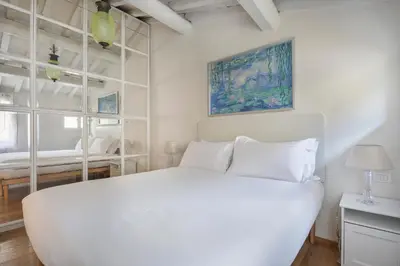 Letto o letti in una camera di Florentine Gem Apartment