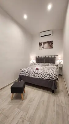Letto o letti in una camera di Luxury Home Il Giglio