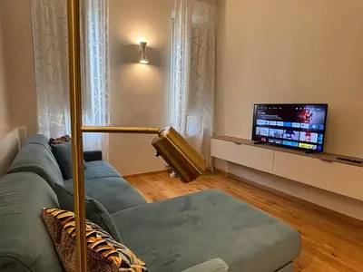 TV o dispositivi per l'intrattenimento presso Chic Stay Boutique Apartments