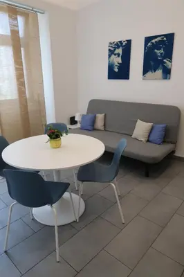 Area soggiorno di Blue Apartment