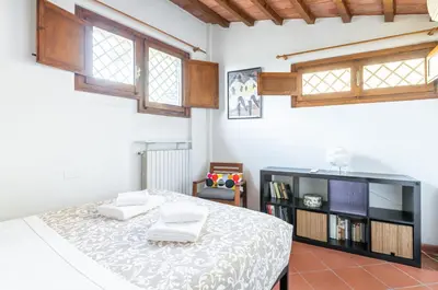 Letto o letti in una camera di GuestHost - Settignano Quiet Apartment with Private Parking