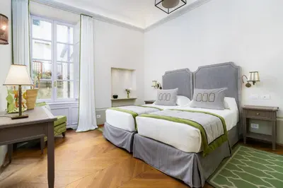 Letto o letti in una camera di Barone Achille -La Dimora degli Affreschi Florence