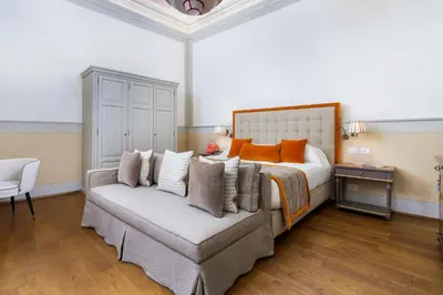 Letto o letti in una camera di Barone Achille -La Dimora degli Affreschi Florence