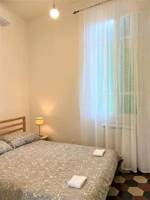 Letto o letti in una camera di BIANCA'S HOME-BREATHTAKING TERRACE 360° VIEW OF FLORENCE