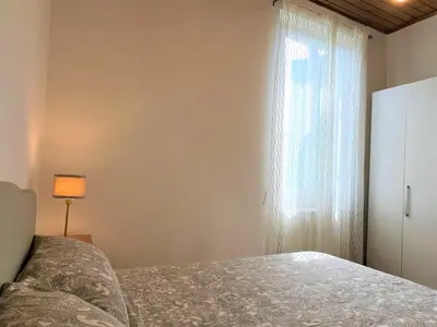 Letto o letti in una camera di BIANCA'S HOME-BREATHTAKING TERRACE 360° VIEW OF FLORENCE
