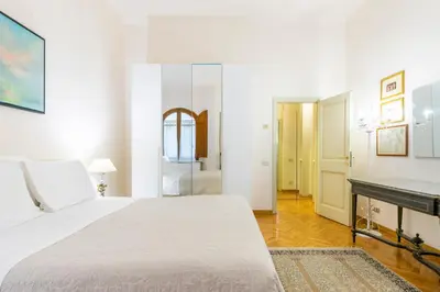 Letto o letti in una camera di Borgo San Jacopo